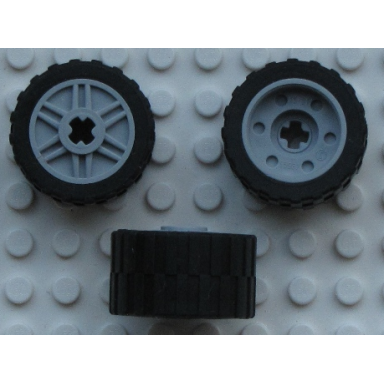 light bluish gray wheel 18mm d x 14mm with axle hole fake bolts and shallow spokes with black tire 24 x 14 shallow tread 55982 30648