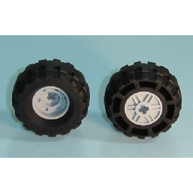 light bluish gray wheel 18mm d x 14mm with axle hole fake bolts and shallow spokes with black tire 37 x 18r 55982 56891