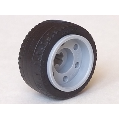 light bluish gray wheel 18mm d x 14mm with axle hole fake bolts and shallow spokes with black tire 24 x 12 low 55982 18977