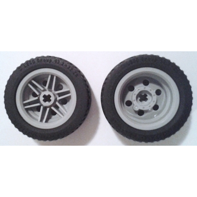 light bluish gray wheel 30.4mm d x 20mm with no pin holes and reinforced rim with black tire 43.2 x 22 zr 56145 44309