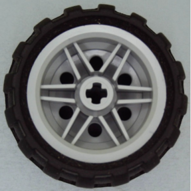light bluish gray wheel 30.4mm d x 20mm with no pin holes and reinforced rim with black tire 43.2mm d x 26mm balloon small 56145 61481