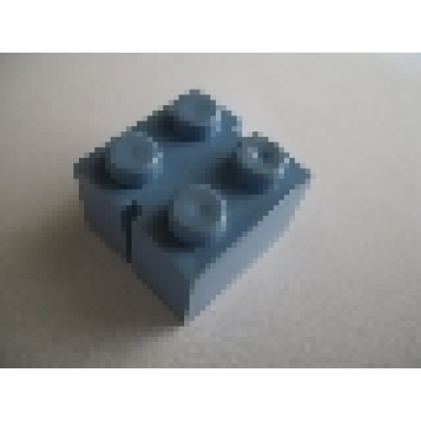 medium blue brick 2 x 2 without bottom tubes slotted with 2 slots opposite