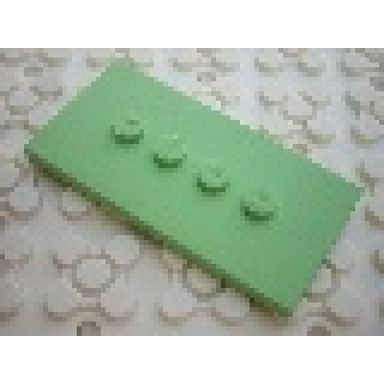 medium green tile modified 3 x 6 with 4 studs in center