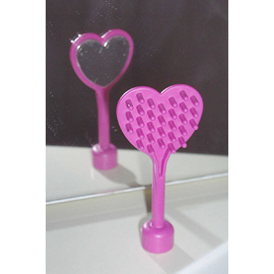 dark pink duplo utensil hairbrush heart-shaped with mirror on back