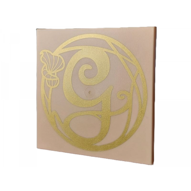 light nougat tile 6 x 6 with gold calligraphy letter g and flower pattern