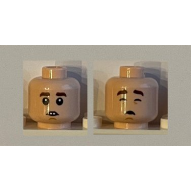 light nougat minifigure head dual sided child reddish brown eyebrows teeth concerned eyes closed pattern