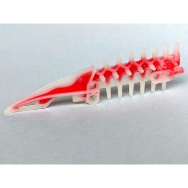 milky white bionicle weapon spined long blade with marbled red pattern