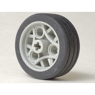 light gray wheel 36.8 x 14 zr with axle hole 3 pin holes and fixed black rubber tire