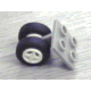 light gray plate modified 2 x 2 thin with dual wheels holder - split pins with white wheels and black tires 4870 4624 3139