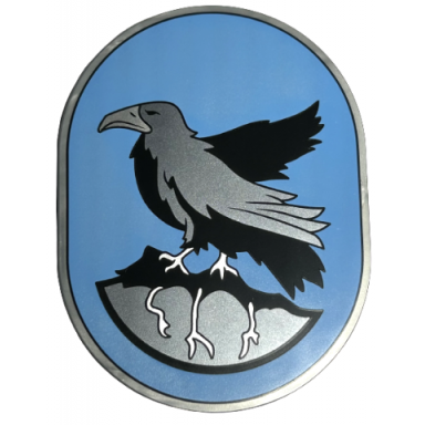 flat silver tile round 6 x 8 oval with ravenclaw crest with black and pearl dark gray eagle and rock with roots on medium blue background pattern