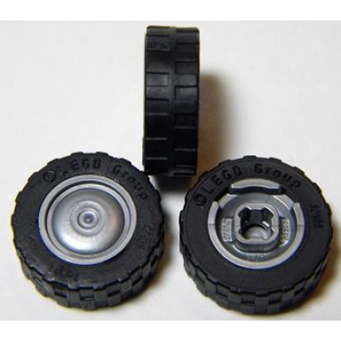 flat silver wheel 11mm d x 6mm with smooth hubcap with black tire 17.5mm d x 6mm with shallow staggered treads - band around center of tread 93594 92409