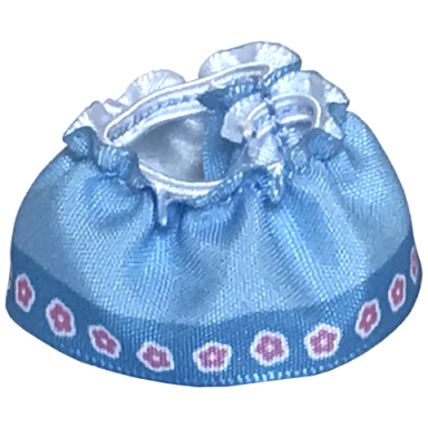 bright light blue duplo wear cloth skirt satin with medium blue hem and bright pink flowers pattern