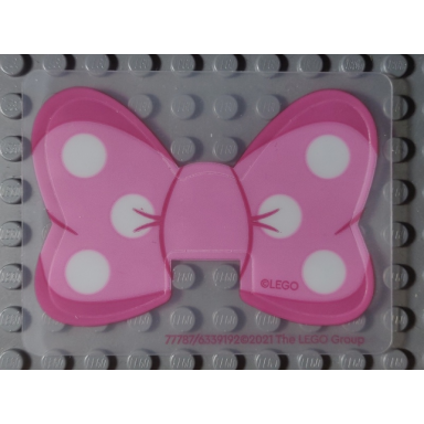 plastic bow with white polka dots on bright pink and dark pink background pattern