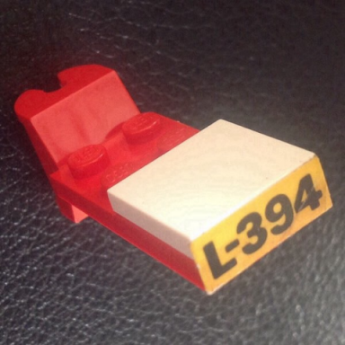 stickered assembly 5 x 2 x 2 3 with black l-394 on yellow background pattern sticker - set 394 - 1 tile 2 x 2 1 hinge plate 2 x 4 articulated