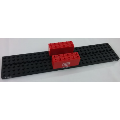 stickered assembly 28 x 6 x 2 2 3 with white 7740 and db pattern on both sides stickers - set 7740 - 1 train base 6 x 28 with 11 round holes each end 2 brick modified 2 x 6 x 2 weight - bottom openings center seam on ends
