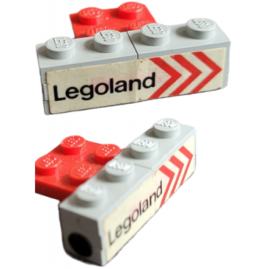 stickered assembly 4 x 3 x 1 with legoland and red chevrons on side and black dot pattern on both ends model right side stickers - set 687 - 2 plate 1 x 1 4 plate 1 x 2 1 plate 2 x 3