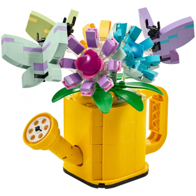 flowers in watering can