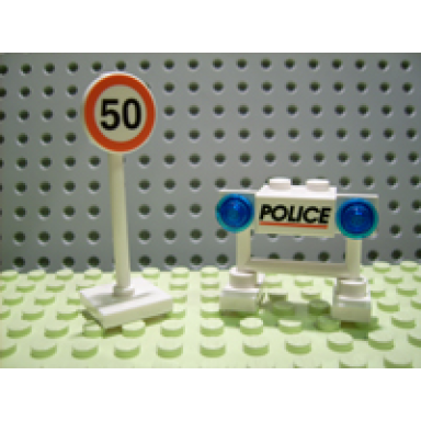 advent calendar 2006 city day 17 - police barricade and speed limit sign